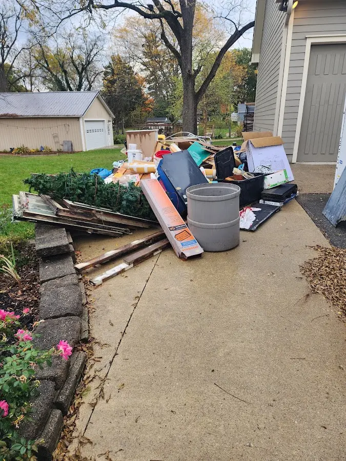 Dumpster being loaded with debris for 30 Yard Dumpster Rental in Seacliff